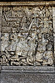 Candi Panataran - Main Temple. Ramayana relief nr 66. Rawana and his wives flee from Lanka. 